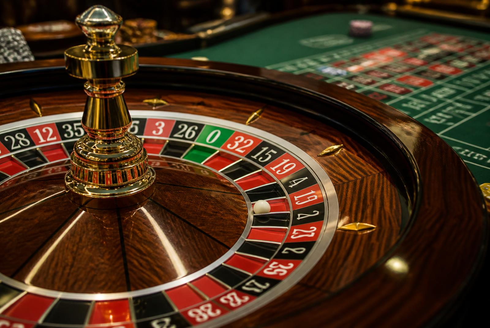 Close-up of a professional roulette wheel on a casino party table